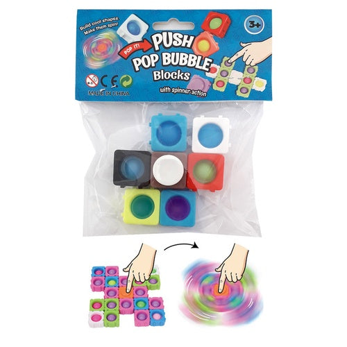 Spinning push pop blocks